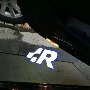 VW Golf R door lights projecting the high-definition silver performance R logo onto the ground in bright LED.