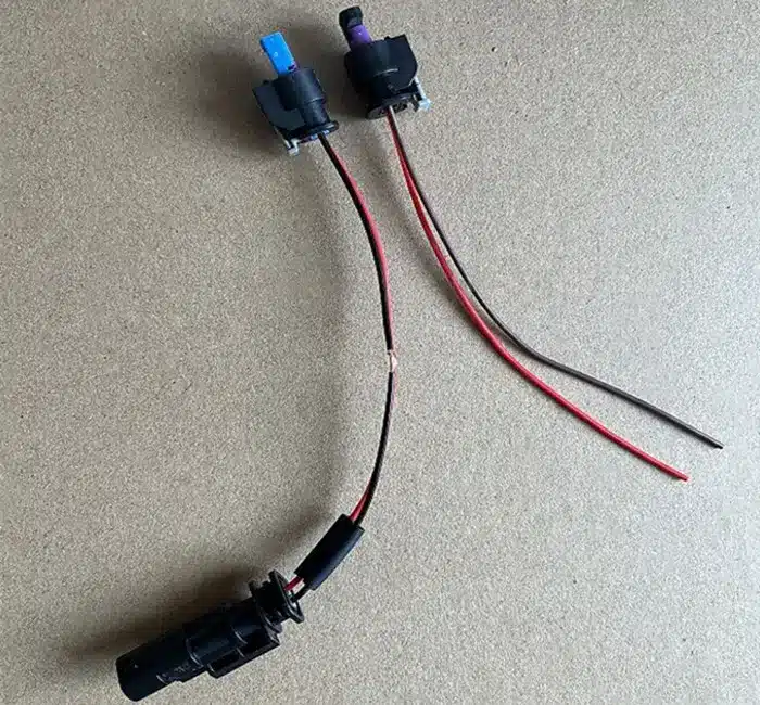 How to Connect a VW LED Emblem to the LED Bar Connector 2 VW LED emblem T-harness connection method showing factory bar plug